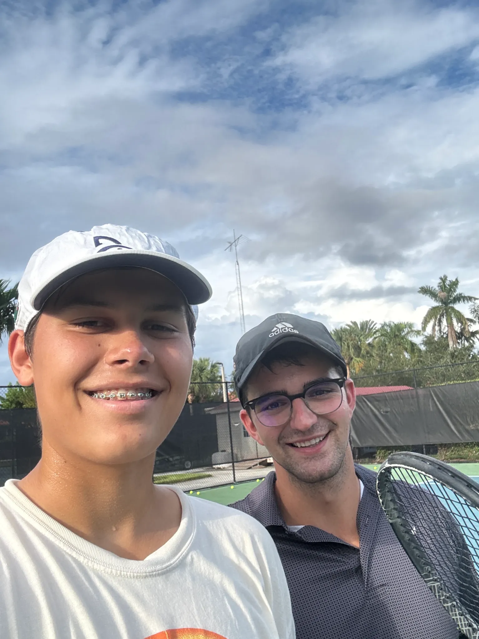 Alexander Ramey with Coach Andreu on the tennis court